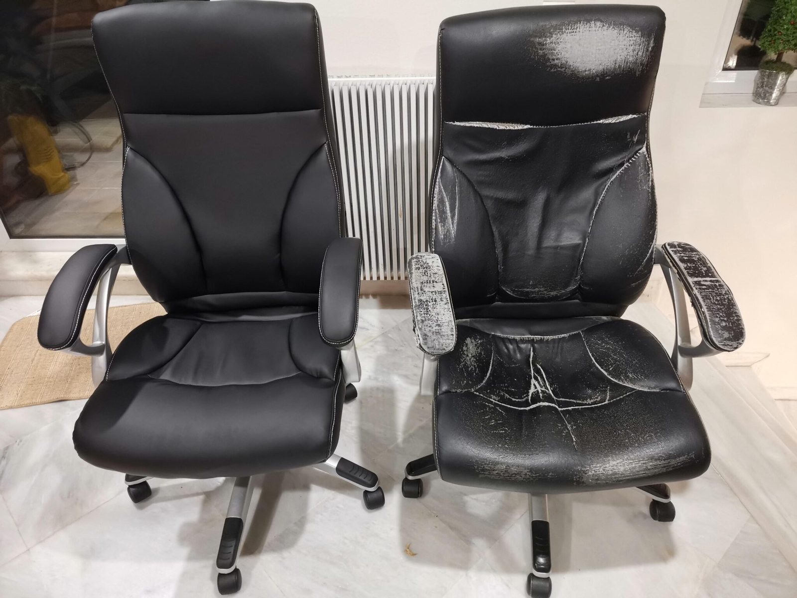 Two identical black office chairs side by side: on the left, refurbished with smooth new upholstery; on the right, the original with cracked, peeling seat, back and armrests